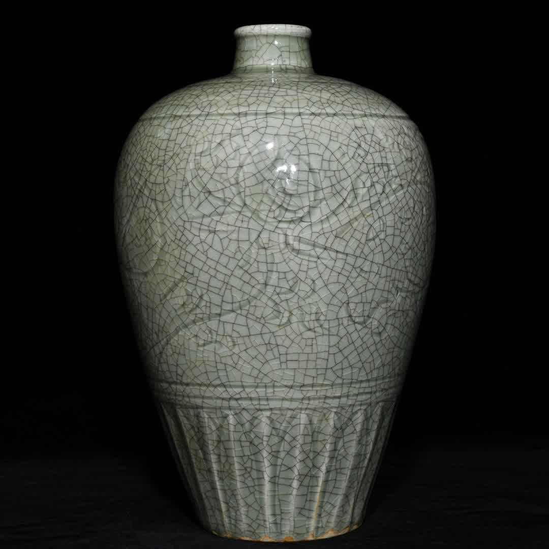 A Qinglongquan kiln carved plum vase: Qinglongquan kiln carved plum vase SIZE: H:32cm D:21cm (The Dimensions Of All Batches Are Manually Measured.If You Need More Detailed Information, Please Contact Our Customer Service Before Bidding.)