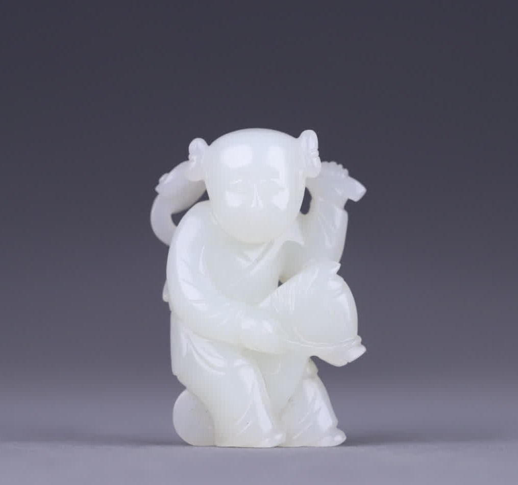 A Qing Dynasty old Hetian jade ruyi boy carving: Qing Dynasty old Hetian jade ruyi boy carving jade delicate white carving exquisite carving boy carving boy riding on horse holding ruyi innocence and childlike vivid image SIZE: 5.7x3.9x2.2cm W:48.8g
