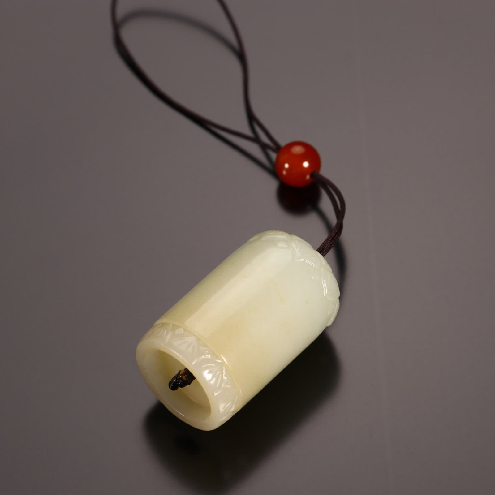 A Qing Dynasty Hetian jade has a Buddha pendant in its heart: Qing Dynasty Hetian jade has a Buddha pendant in its heart SIZE: H:3.3cm W:2.0cm W:22g (The Dimensions Of All Batches Are Manually Measured.If You Need More Detailed Information, Please Contact Our Cu