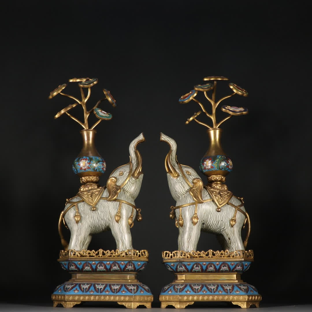 A pair of Qing Dynasty copper gilt cloisonné painting enamel Taiping elephant ornaments: Qing Dynasty Copper gilt cloisonné painting enamel Taiping has a pair of elephant ornaments SIZE: H:38cm W:14.2cm W:1962.2g (The Dimensions Of All Batches Are Manually Measured.If You Need More Detai