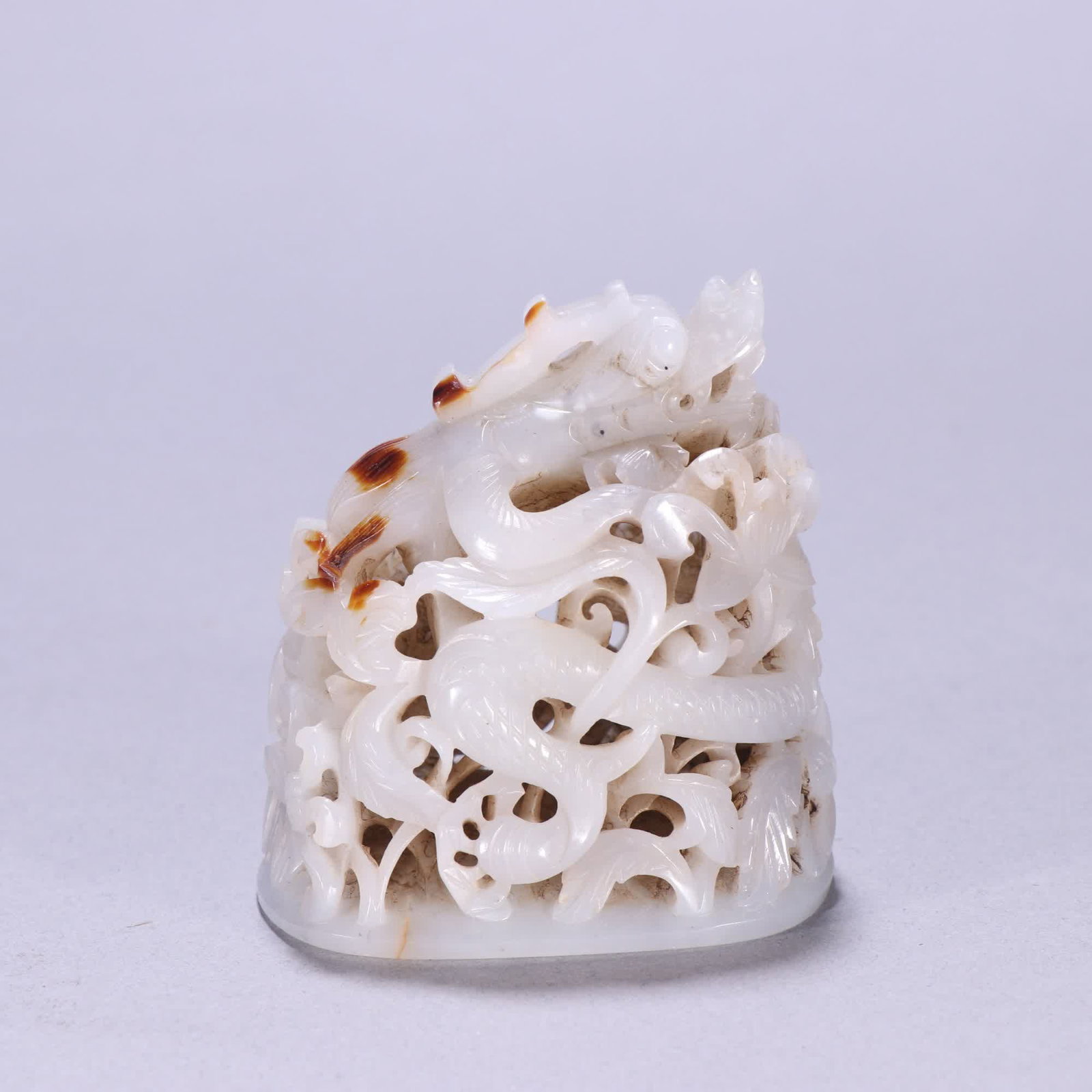 A Qing Dynasty Hetian jade dragon pattern hat top: Qing Dynasty Hetian jade dragon pattern hat top SIZE: H:6.4cm W:5.9cm W:133g (The Dimensions Of All Batches Are Manually Measured.If You Need More Detailed Information, Please Contact Our Customer Ser