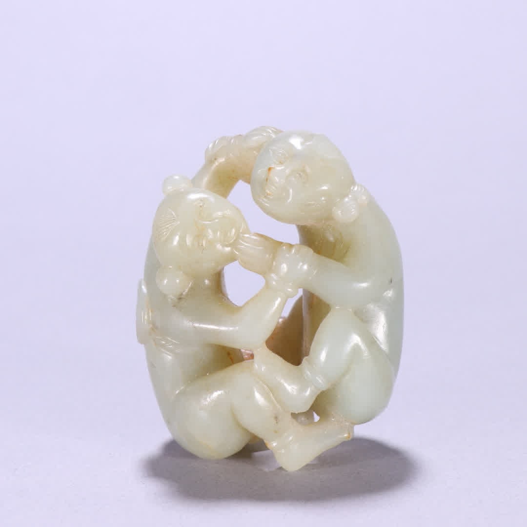 A Qing Dynasty Hetian jade boy playing carving: Qing Dynasty Hetian jade boy play carving SIZE: H:6.6cm W:5.3cm W:136.2g (The Dimensions Of All Batches Are Manually Measured.If You Need More Detailed Information, Please Contact Our Customer Service