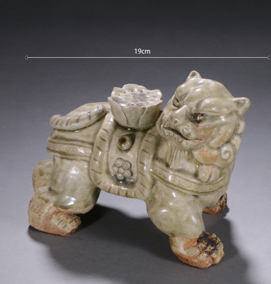 A Song Dynasty celadon lion lotus incense insert: Song Dynasty celadon lion lotus incense insert SIZE: H:13.5cm L:19cm (The Dimensions Of All Batches Are Manually Measured.If You Need More Detailed Information, Please Contact Our Customer Service