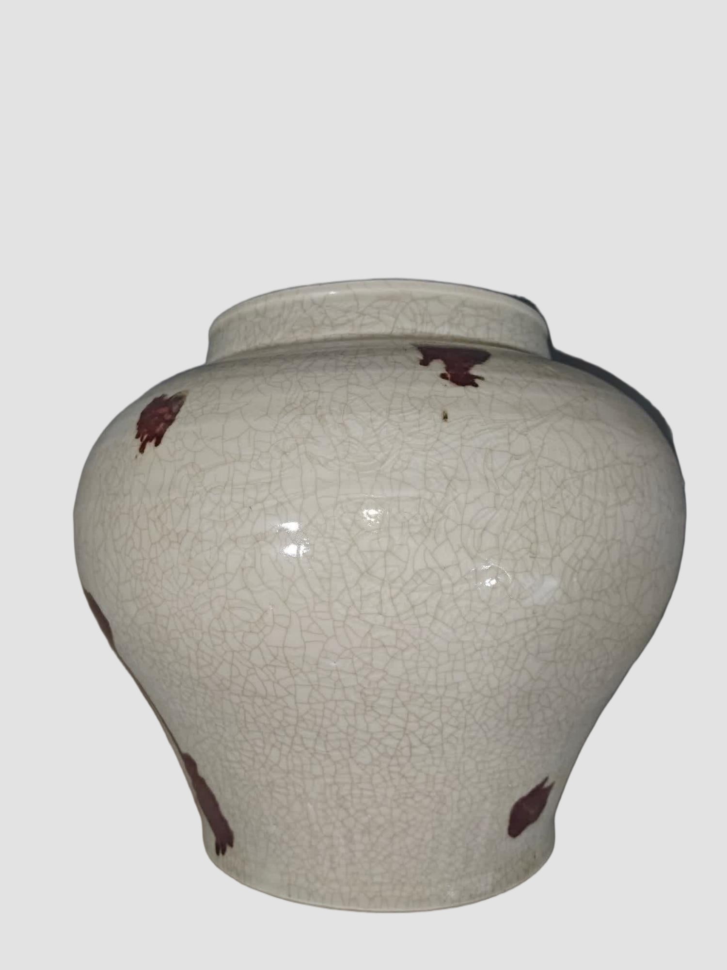 A glazed red brindle jar - 3