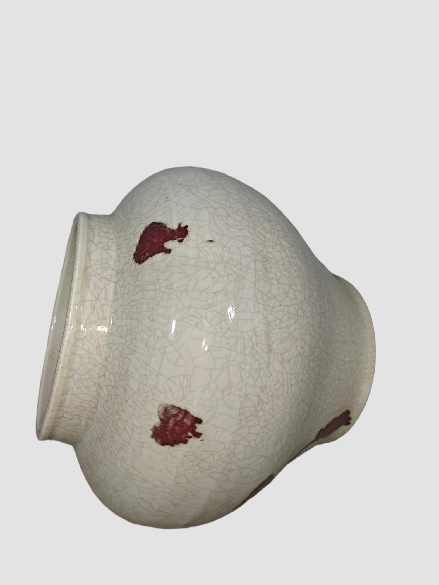 A glazed red brindle jar - 4