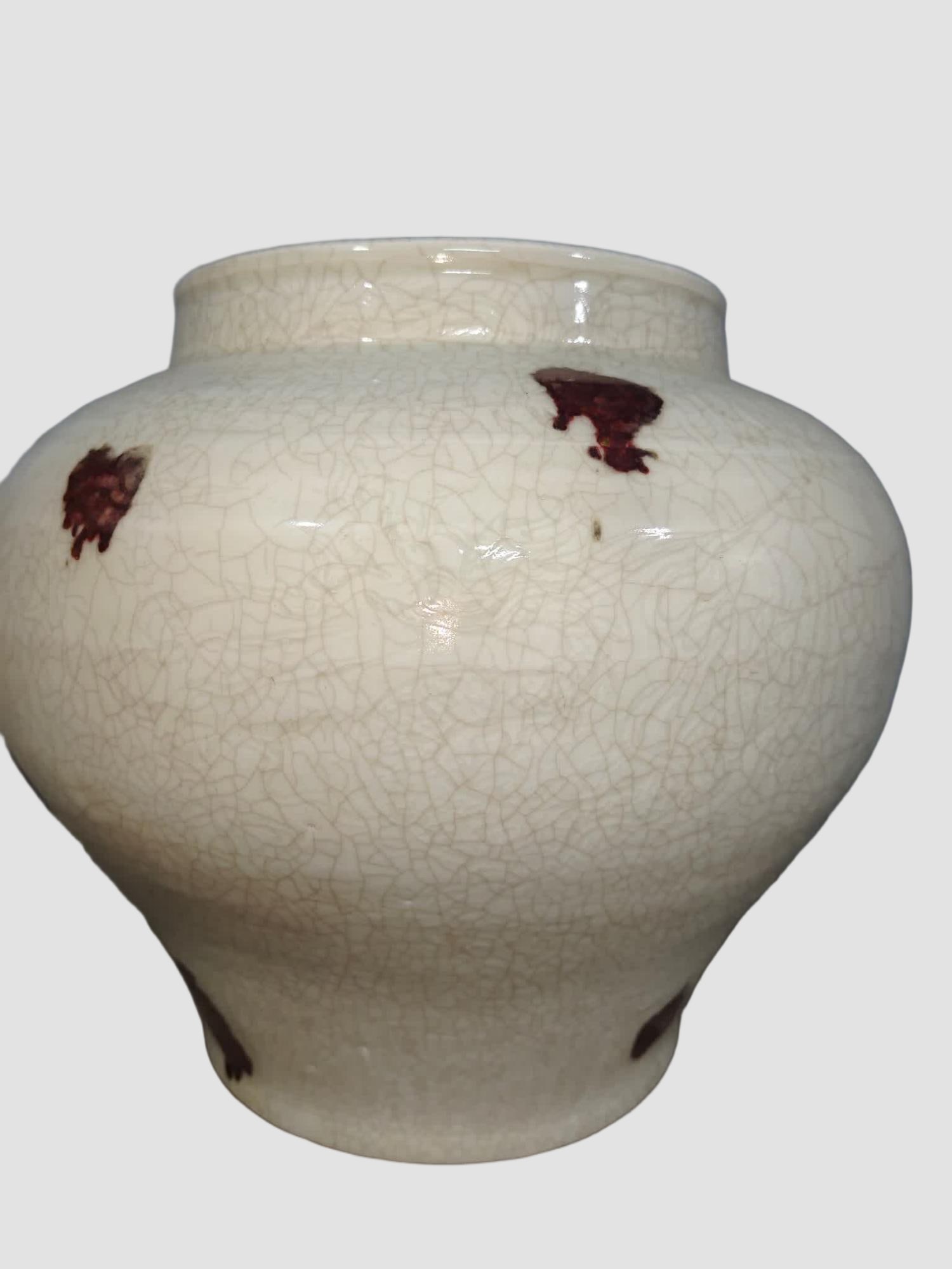 A glazed red brindle jar - 5