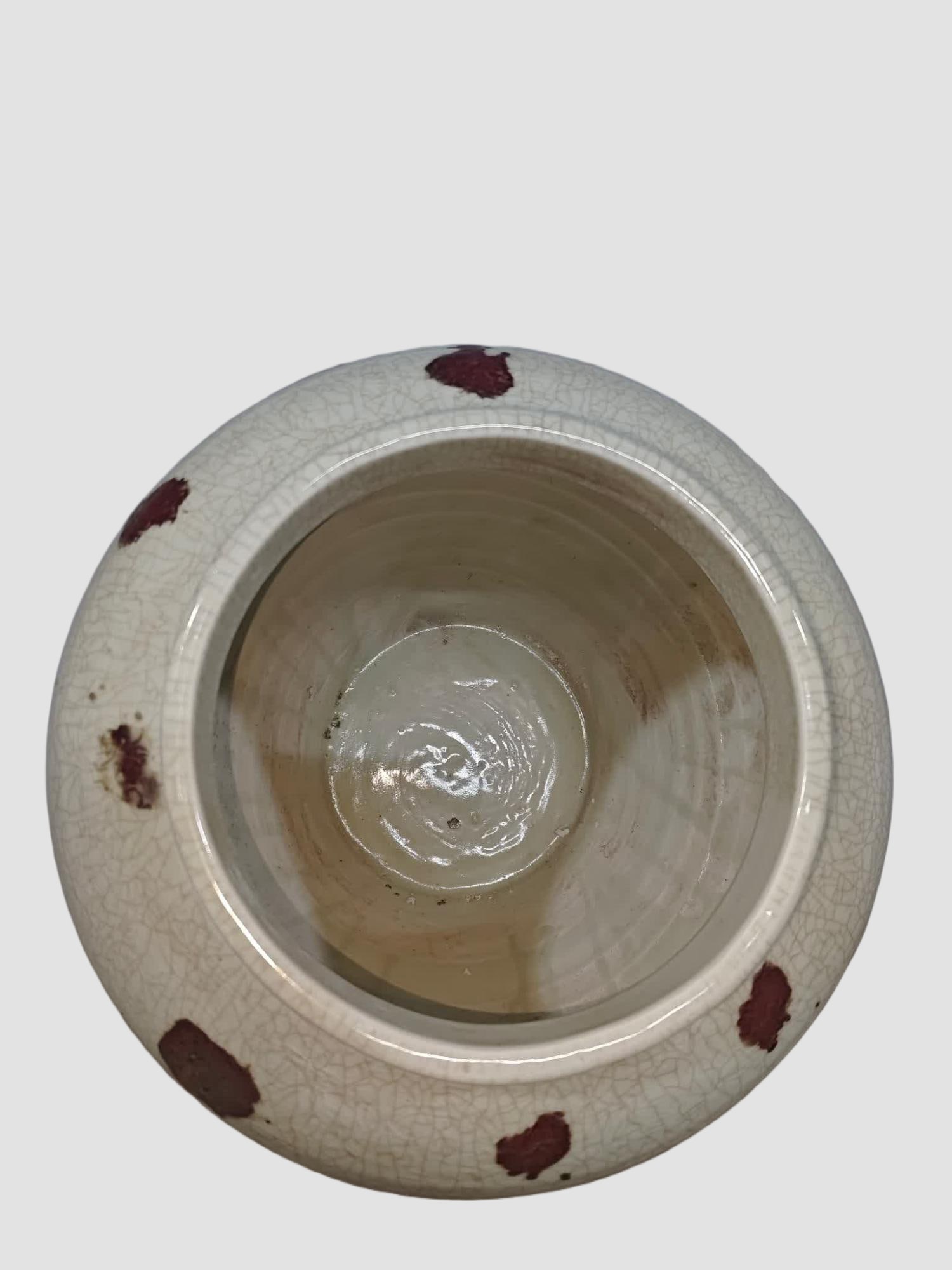 A glazed red brindle jar - 6