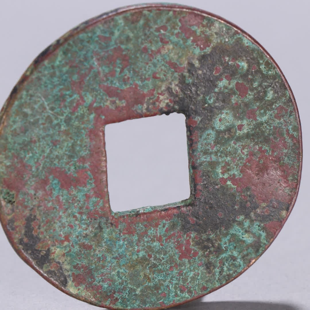A copper half-tael coin - 6