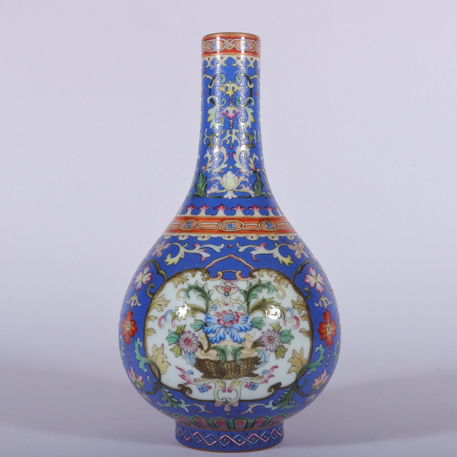 A Qing Qianlong pastel blue ground rolling road with open window floral pattern gall bottle (1 of 8)