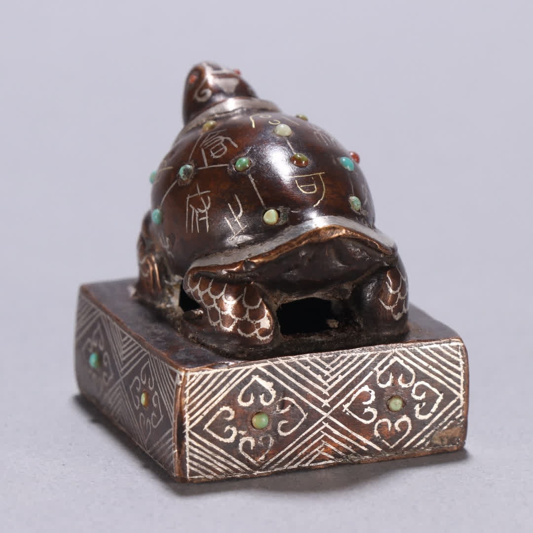 A copper gold and silver turtle button seal - 3
