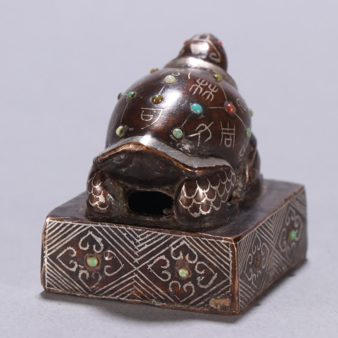 A copper gold and silver turtle button seal - 4