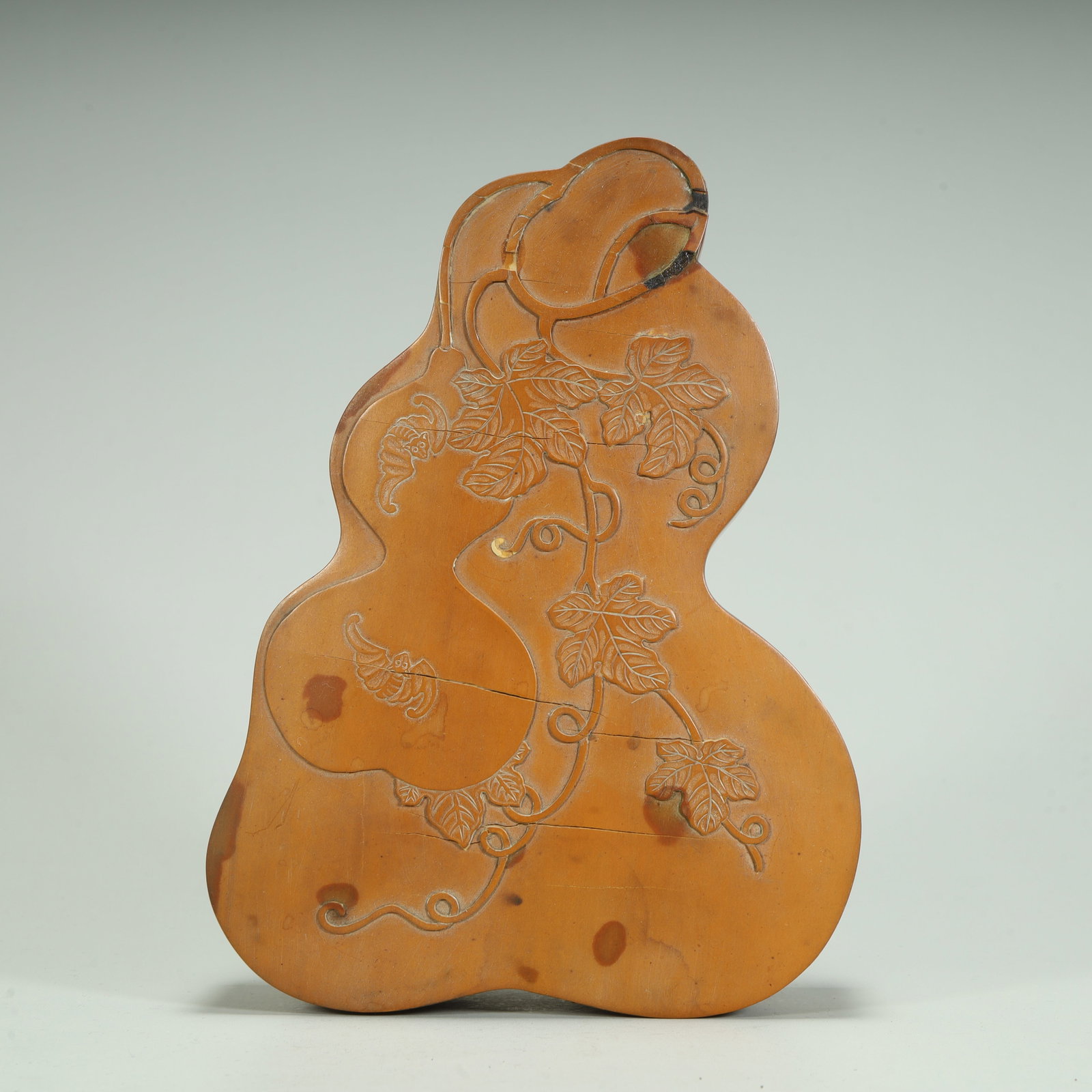 A Qing Dynasty gourd-shaped bamboo yellow Fulu Bandai pattern inkstone box (1 of 8)