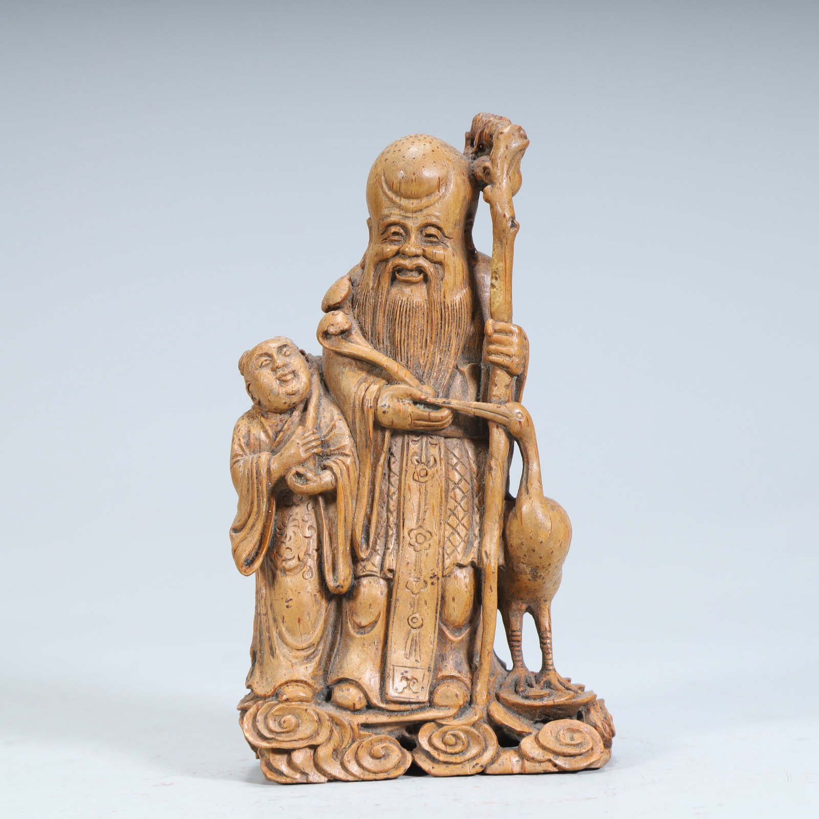 A standing statue of a bamboo carved birthday boy in the Qing Dynasty: Qing Dynasty bamboo carving birthday boy statue SIZE: H:12cm L:7cm W:3.5cm W:75.7g (The Dimensions Of All Batches Are Manually Measured.If You Need More Detailed Information, Please Contact Our Custom