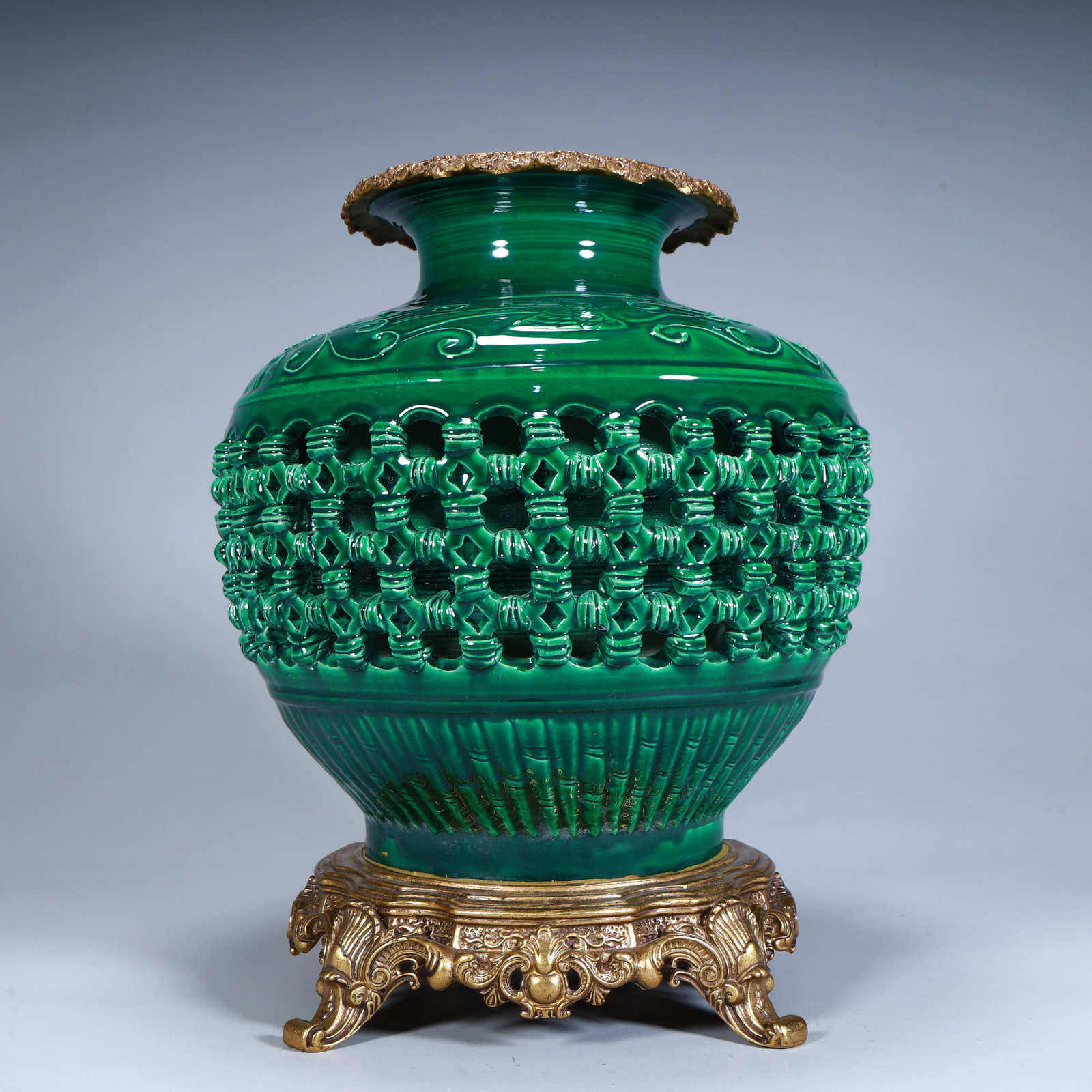 A Qing Dynasty green-glazed hollow double-layer fish basket (1 of 9)