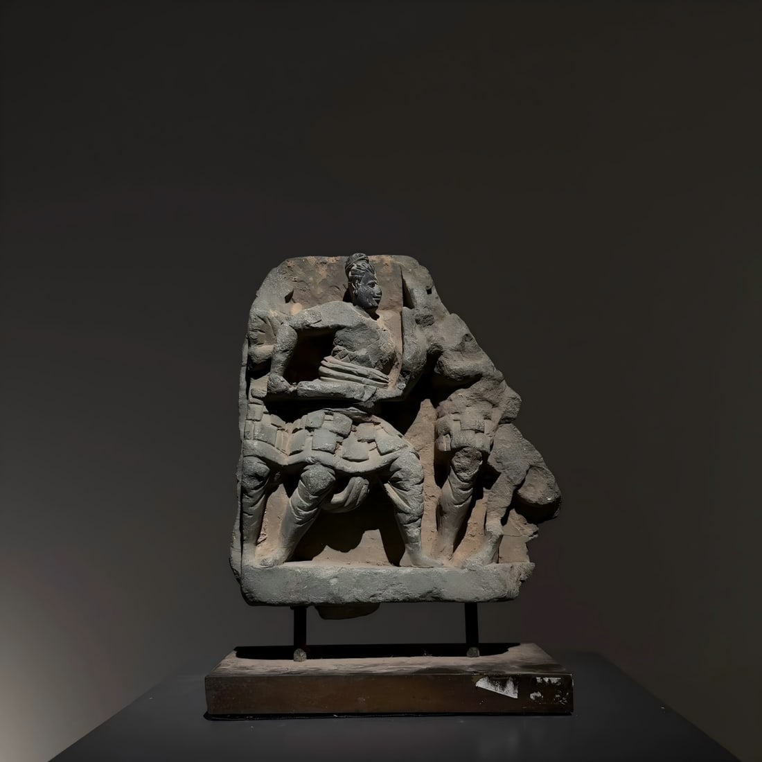 A stone sculpture of a warrior Gandhara from the 2nd to 5th centuries AD (1 of 7)