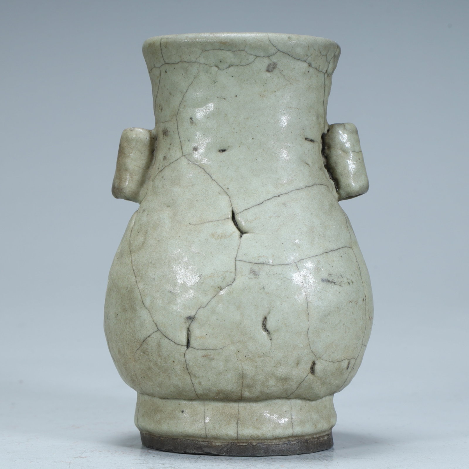 A Qing Dynasty glazed ear bottle: Qing Dynasty Ge glazed ear bottle SIZE: H:12.5cm L:8.5cm W:7cm W:314g (The Dimensions Of All Batches Are Manually Measured.If You Need More Detailed Information, Please Contact Our Customer Service Be