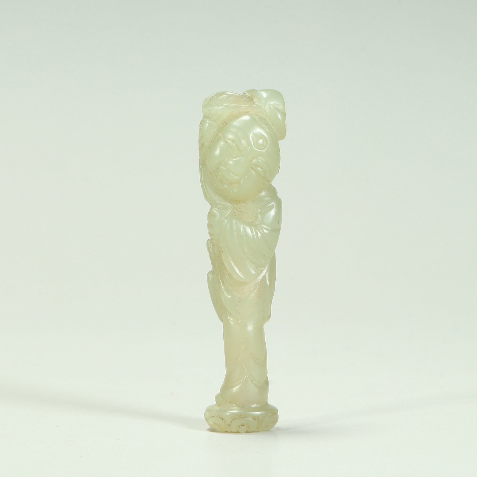 A Qing Dynasty Hetian jade lotus boy ornament: Qing Dynasty Hetian jade holding lotus boy ornaments SIZE: H:5.5cm L:1.3cm W:1.3cm W:11g (The Dimensions Of All Batches Are Manually Measured.If You Need More Detailed Information, Please Contact Our 