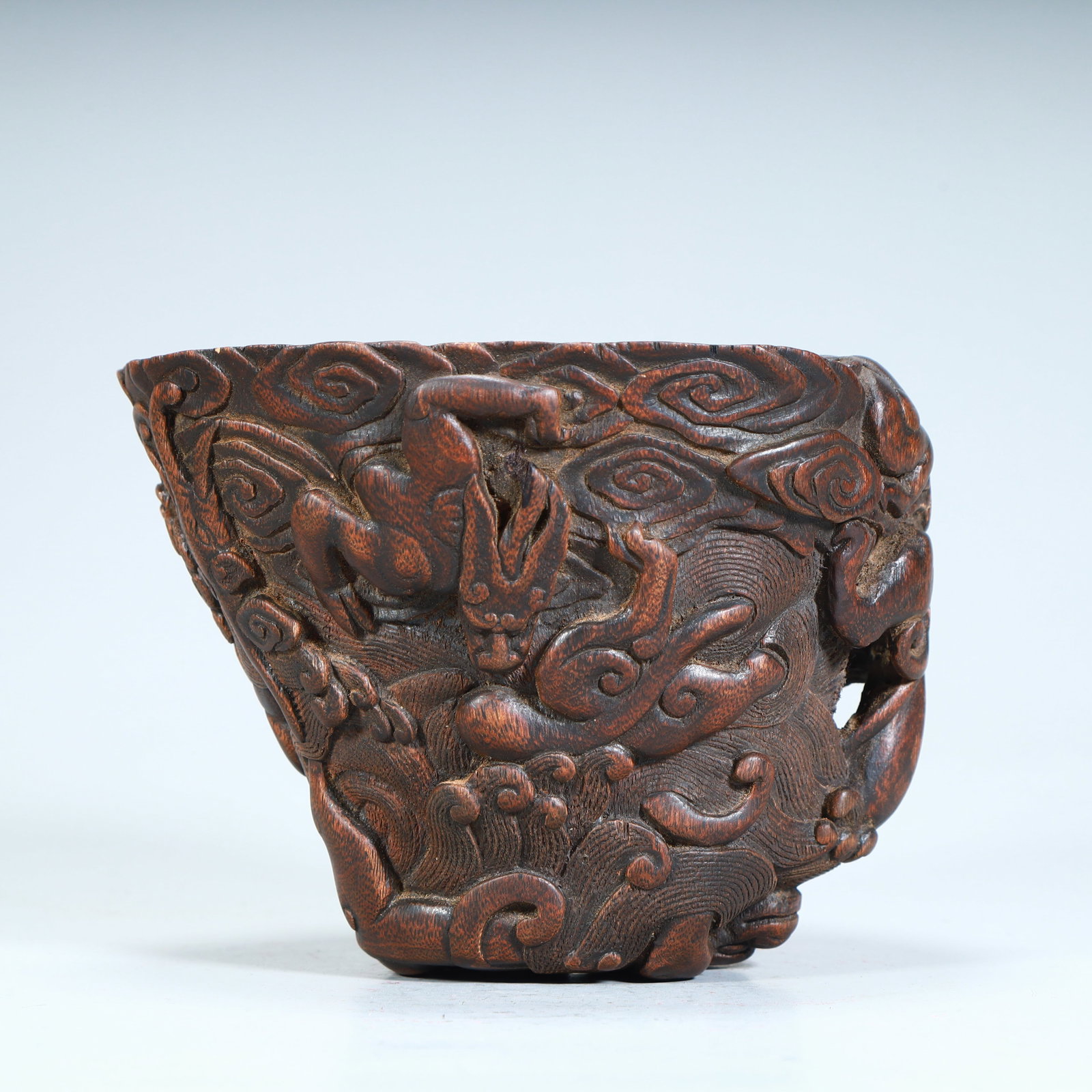 A Qing Dynasty agarwood seawater cloud pattern dragon cup: Qing Dynasty agarwood seawater cloud pattern dragon cup SIZE: H:11cm L:15cm W:12.5cm W:267g (The Dimensions Of All Batches Are Manually Measured.If You Need More Detailed Information, Please Contact O