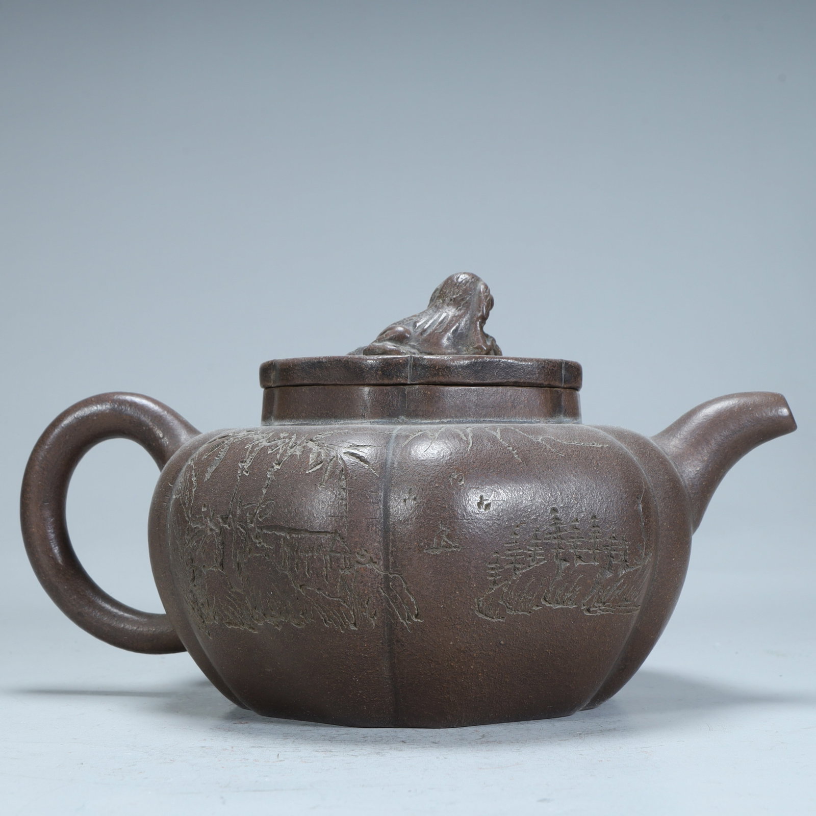 A Qing Dynasty purple sand carved landscape poetry lion button melon ridge pot: Qing Dynasty purple sand carved landscape poetry lion button melon pot SIZE: H:11cm L:24cm W:14cm W:525g (The Dimensions Of All Batches Are Manually Measured.If You Need More Detailed Information, Ple