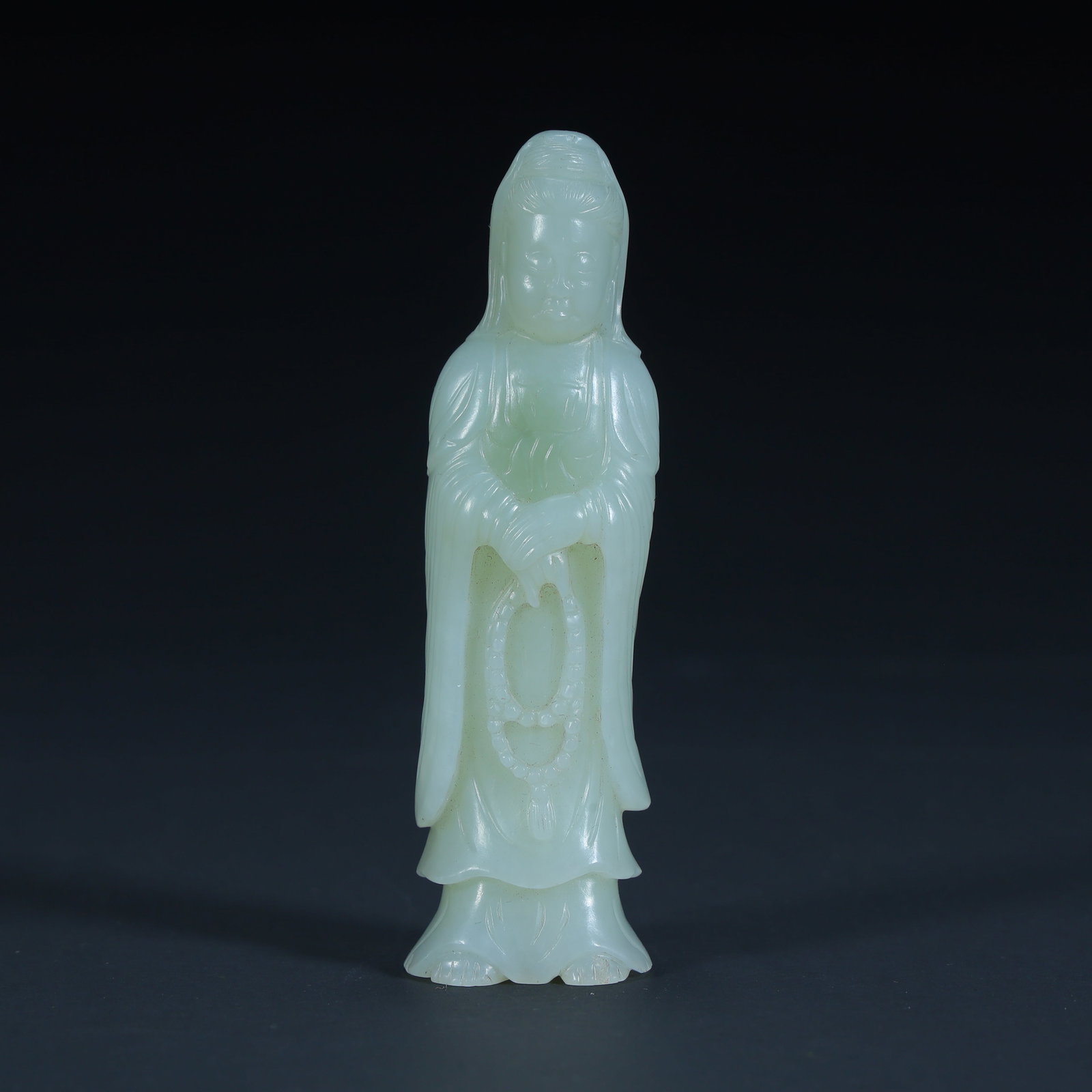 A Qing Dynasty Hetian jade Guanyin statue ornament: Qing Dynasty Hetian jade Guanyin statue ornament SIZE: H:8.8cm L:2.5cm W:2cm W:64.4g (The Dimensions Of All Batches Are Manually Measured.If You Need More Detailed Information, Please Contact Our Cust