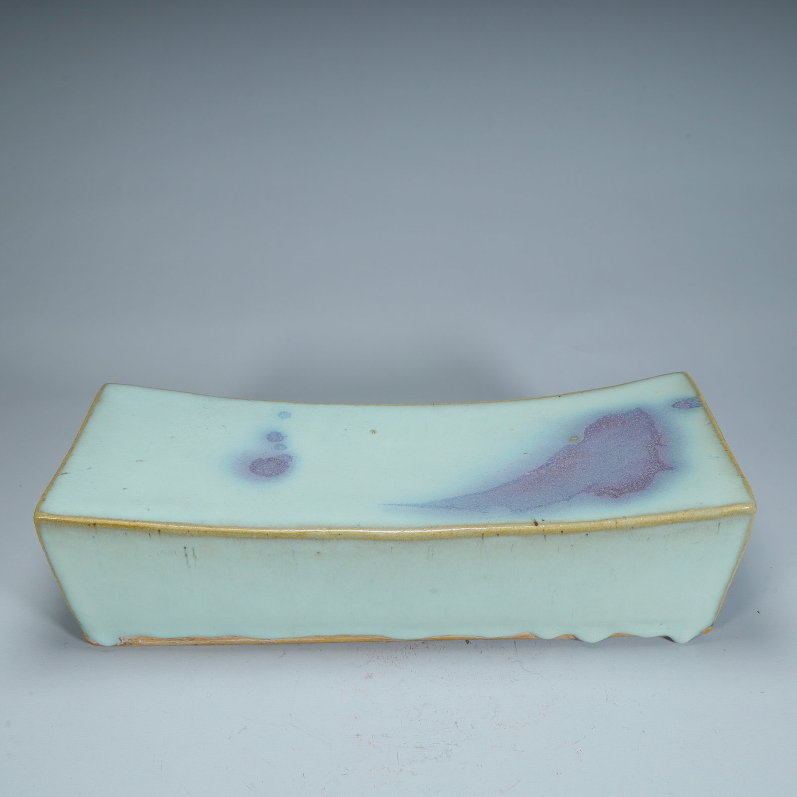 A piece of Song Jun kiln moon white glazed purple spotted porcelain pillow: Song Jun kiln moon white glaze purple spotted porcelain pillow SIZE: Pillow: H: 32cm L: 9.5cm W: 12cm W: 1.9kg (The Dimensions Of All Batches Are Manually Measured.If You Need More Detailed Informatio