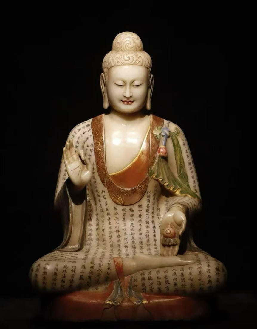 A Northern Qi white jade painted Buddha statue: Northern Qi White Jade Painted Buddha Statue Hand-painted scriptures are exquisitely crafted SIZE: H:68cm W:46cm T:35cm (The Dimensions Of All Batches Are Manually Measured.If You Need More Detailed I
