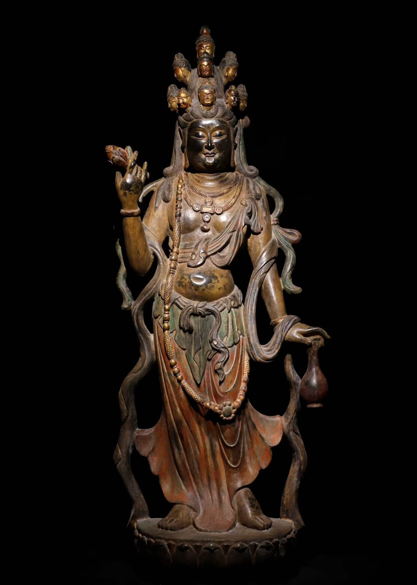 A Tang Dynasty bluestone painted eleven-sided Guanyin: Tang Dynasty bluestone painted eleven-sided Guanyin The skin shell is naturally textured and exquisitely crafted SIZE: H:140cm W:58cm T:40cm (The Dimensions Of All Batches Are Manually Measured.If You