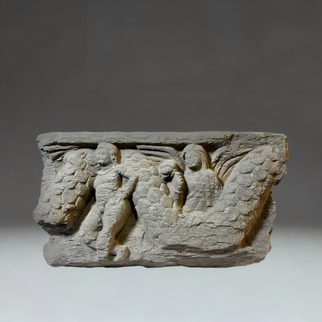 A Gandhara boy carrying a flower cable from the 2nd to the 5th centuries AD: Gandhara carrying the flower cable boy" is often found in the relief of the pagoda pedestal, showing the parade scene of the "flower cable" woven by flowers and branches on the shoulders of the child 