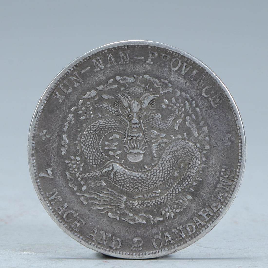 A silver coin made in Yunnan Province in the Qing Dynasty made by Guangxu Yuan Treasure Warehouse: In the Qing Dynasty, Yunnan Province made Guangxu Yuanbao Ping seven qian and two cents silver coins SIZE: D:4cm W:26.7g (The Dimensions Of All Batches Are Manually Measured.If You Need More Detailed 