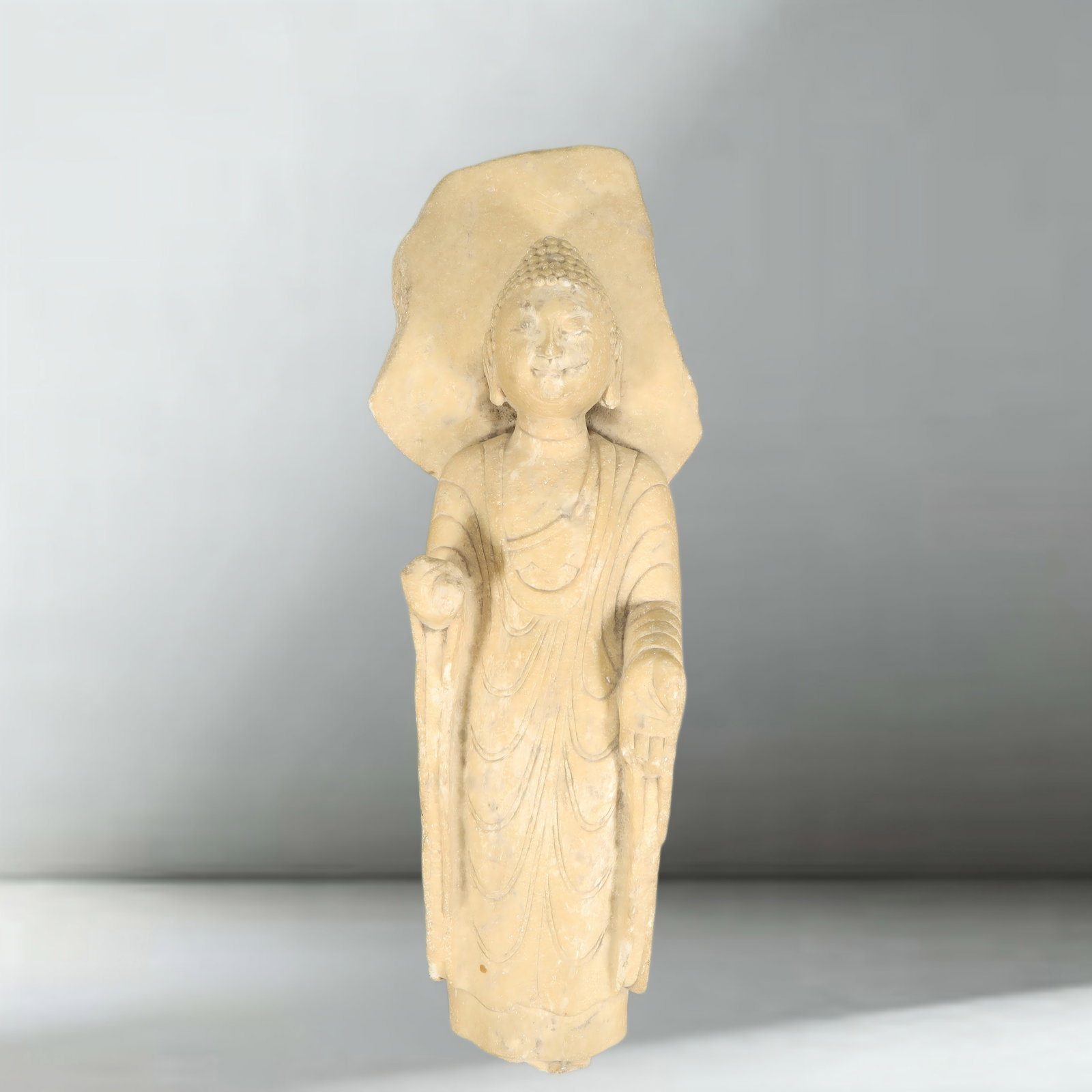 A Northern Qi Shi carved Shakyamuni Buddha afterimage: Northern Qi Shi carved the afterimage of Shakyamuni Buddha SIZE: H:38cm L:14cm W:7cm W:3.1kg (The Dimensions Of All Batches Are Manually Measured.If You Need More Detailed Information, Please Contact 