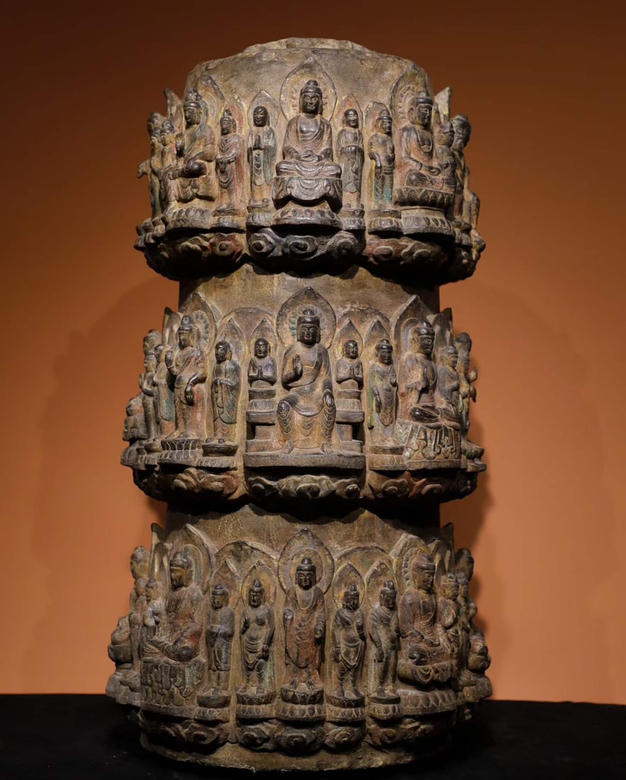 A Tang Dynasty bluestone painted thousand Buddha pillars: Tang Dynasty bluestone painted Thousand Buddha Pillars Full of carved Buddha statues are visually shocking and exquisitely crafted SIZE: H: 82cm Max D: 43cm (The Dimensions Of All Batches Are Manually