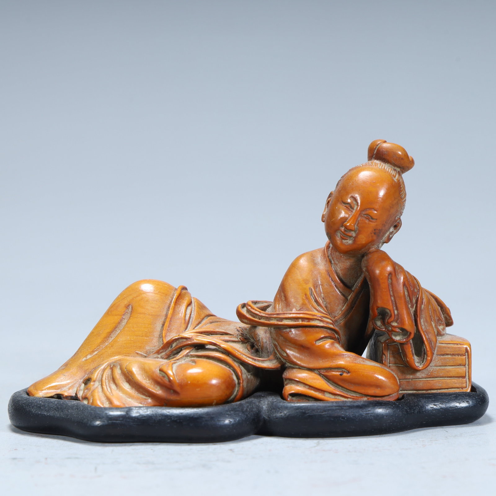 A Qing Dynasty boxwood carving recumbent literati ornament (1 of 8)