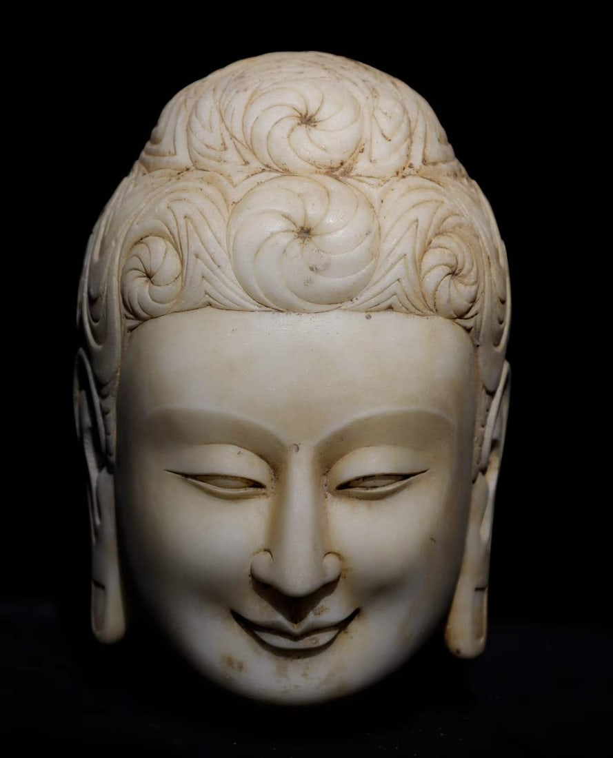 A piece of Northern Wei white jade Buddha head: Northern Wei Dynasty Han white jade Buddha head SIZE: H:36cm (The Dimensions Of All Batches Are Manually Measured.If You Need More Detailed Information, Please Contact Our Customer Service Before Bidd