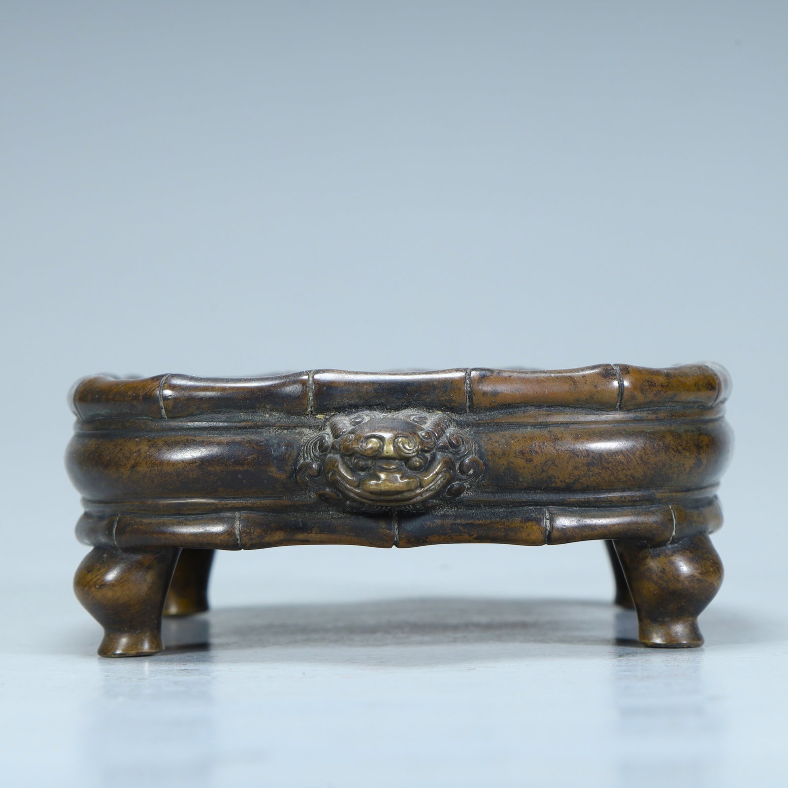 A Qing Dynasty copper bamboo pattern animal ear four-legged washing incense burner (1 of 9)
