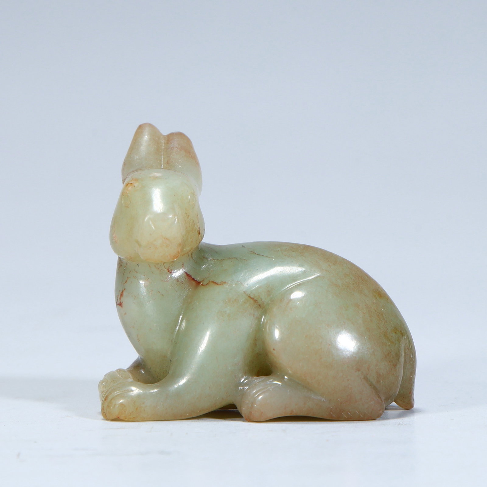 A Qing Dynasty Hetian green and white jade belt with a rabbit-shaped handle: Qing Dynasty Hetian green and white jade belt Qin rabbit-shaped handle SIZE: H:5.5cm L:5cm W:3.5cm W:100g (The Dimensions Of All Batches Are Manually Measured.If You Need More Detailed Information, Pl