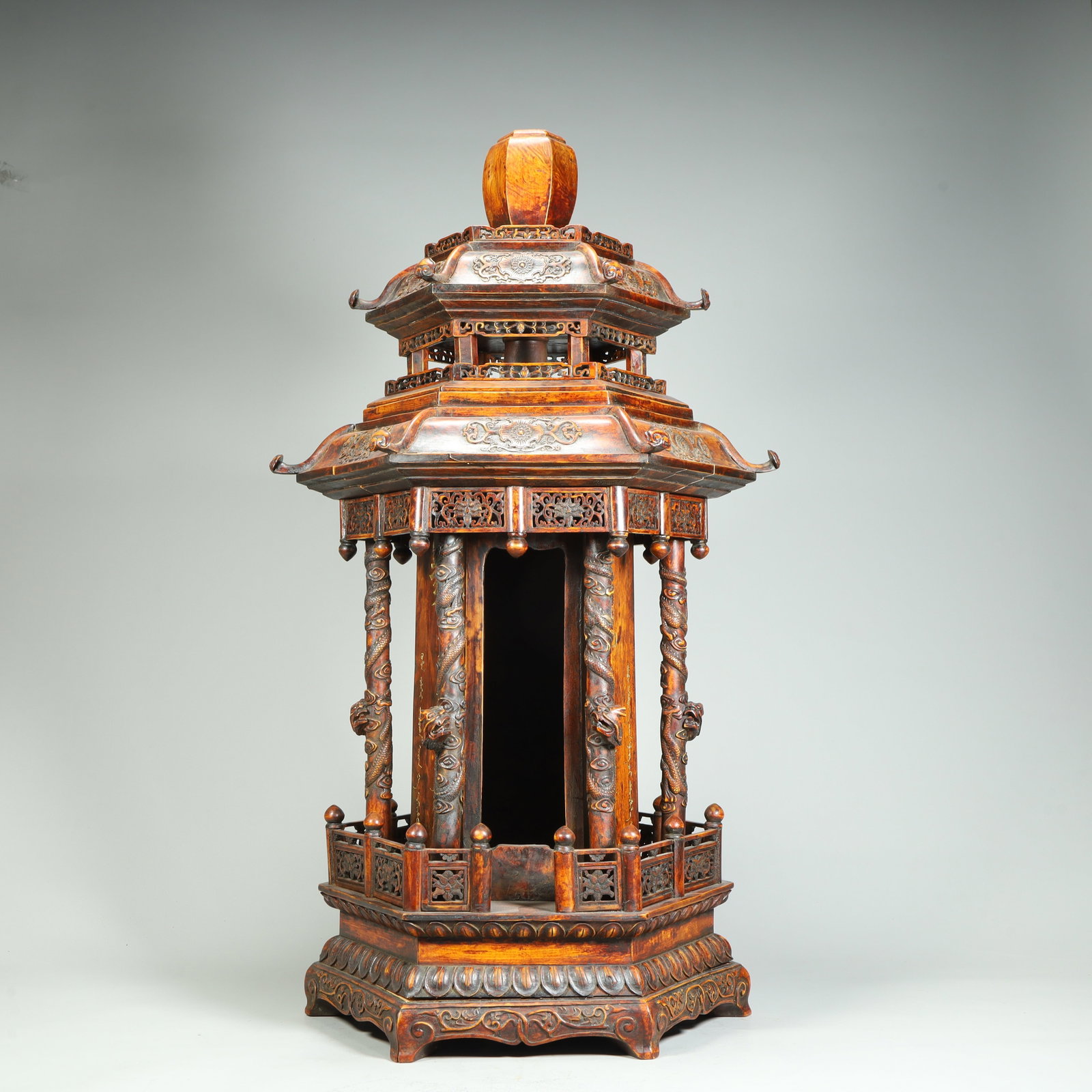 A Qing Dynasty wood carved dragon pattern hexagonal pavilion-style Buddha shrine: Qing Dynasty wood carved dragon pattern hexagonal pavilion style Buddha niche SIZE: H:68cm L:38cm W:28cm W:8.6kg (The Dimensions Of All Batches Are Manually Measured.If You Need More Detailed Informat