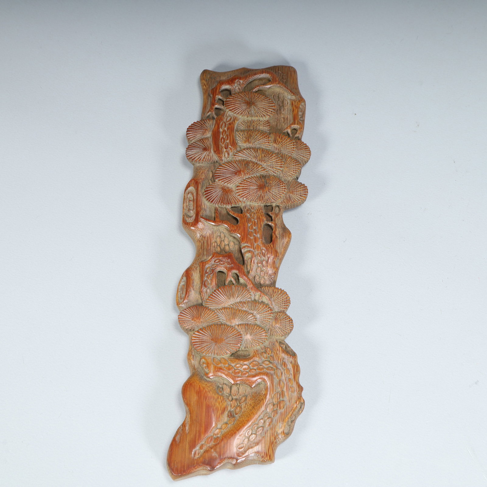 A Qing Dynasty bamboo carved pine pattern armrest: Qing Dynasty bamboo carved pine pattern armrest SIZE: H:20cm L:6cm W:1.5cm W:84g (The Dimensions Of All Batches Are Manually Measured.If You Need More Detailed Information, Please Contact Our