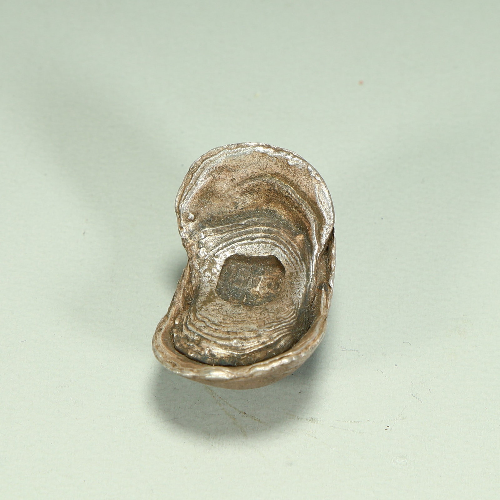A small silver ingot from the Qing Dynasty (1 of 7)