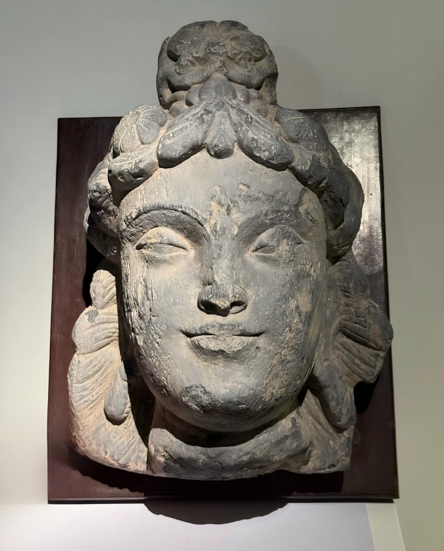 A Kendra Maitreya Buddha of the 2nd-5th centuries AD: Kindra Maitreya Buddha SIZE: W:30cm H:20cm (The Dimensions Of All Batches Are Manually Measured.If You Need More Detailed Information, Please Contact Our Customer Service Before Bidding.)