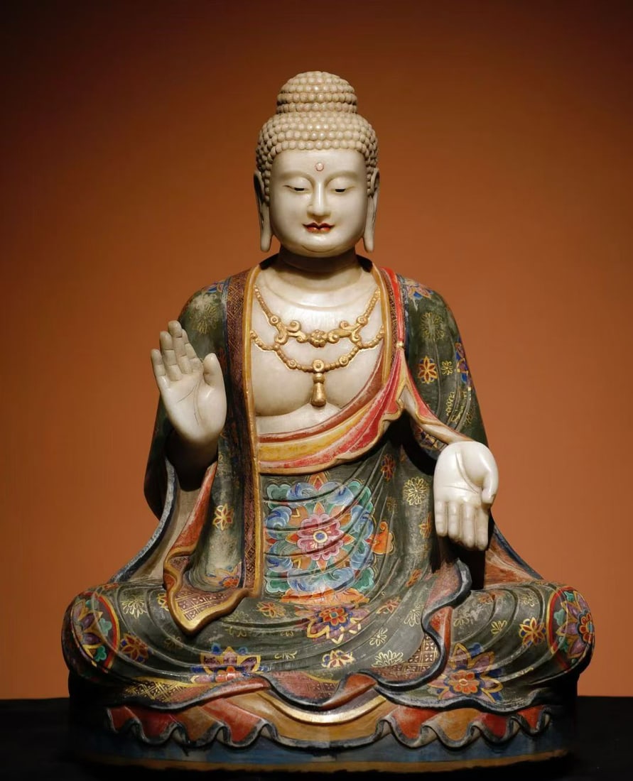 A Tang Dynasty white jade painted Buddha statue: Tang Dynasty white jade painted Buddha statue The painting is exquisite and the Dharma is solemn SIZE: H:67cm W:46cm T:35cm (The Dimensions Of All Batches Are Manually Measured.If You Need More Detail