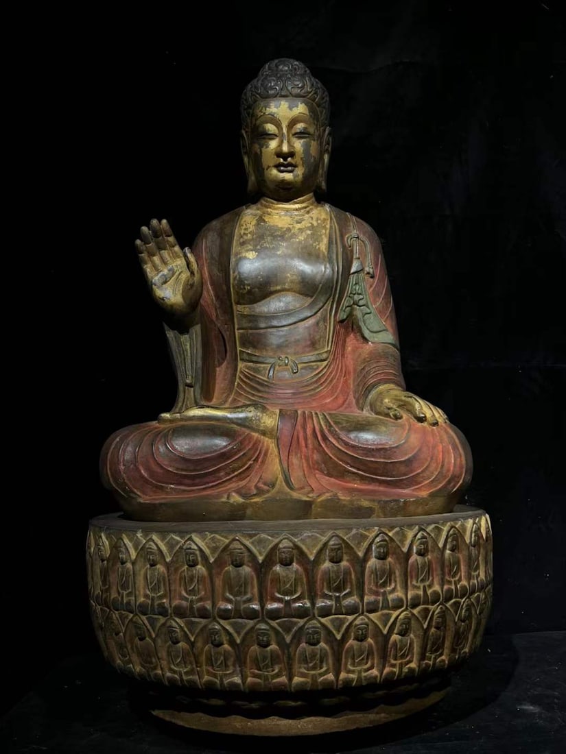 A seated statue of Shakyamuni Buddha painted and gilded in the Tang Dynasty: Tang Dynasty bluestone painted gilded seated statue of Shakyamuni Buddha SIZE: H:100cm (The Dimensions Of All Batches Are Manually Measured.If You Need More Detailed Information, Please Contact Our Cu