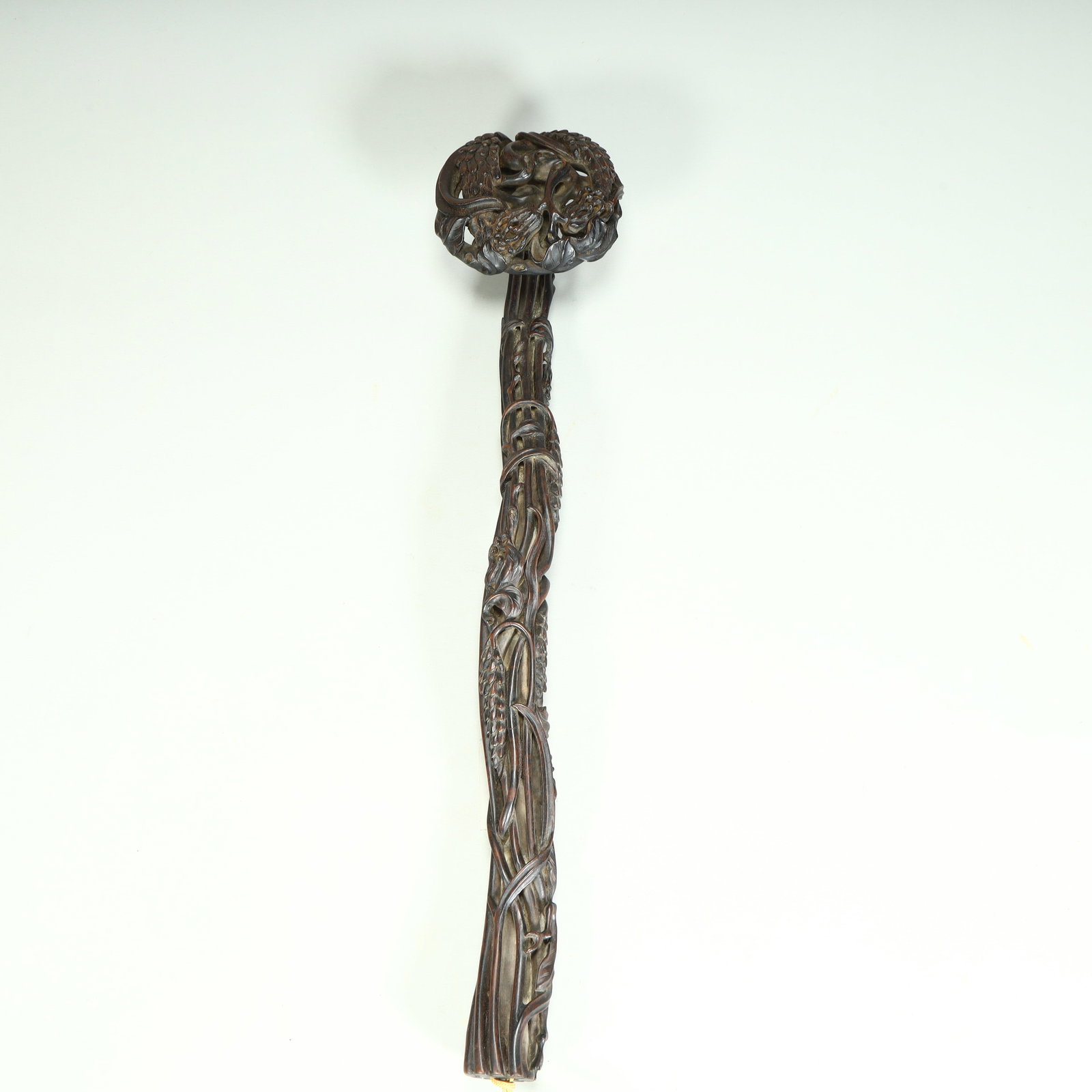 A piece of Qing Dynasty wood carving grain harvest pattern ruyi (1 of 12)