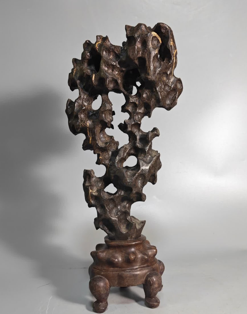 A Qing Dynasty black Taihu Shishanzi study ornament: Qing Dynasty Black Taihu Shishanzi study ornament SIZE: With base H: 42cm W: 18cm T: 10cm W: 3355g (The Dimensions Of All Batches Are Manually Measured.If You Need More Detailed Information, Please Co