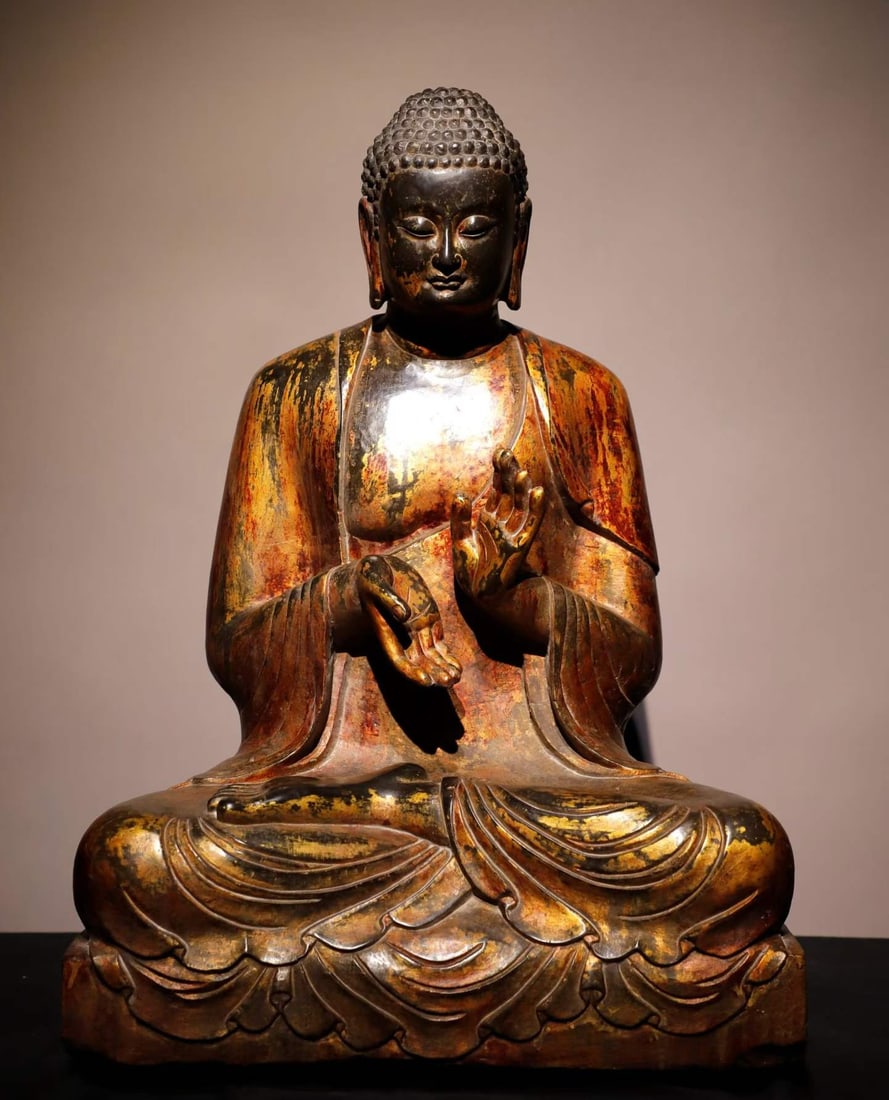 A Tang Dynasty bluestone gilt Buddha statue: Tang Dynasty bluestone gilt Buddha statue SIZE: H:68cm W:47cm T:35cm (The Dimensions Of All Batches Are Manually Measured.If You Need More Detailed Information, Please Contact Our Customer Service Bef