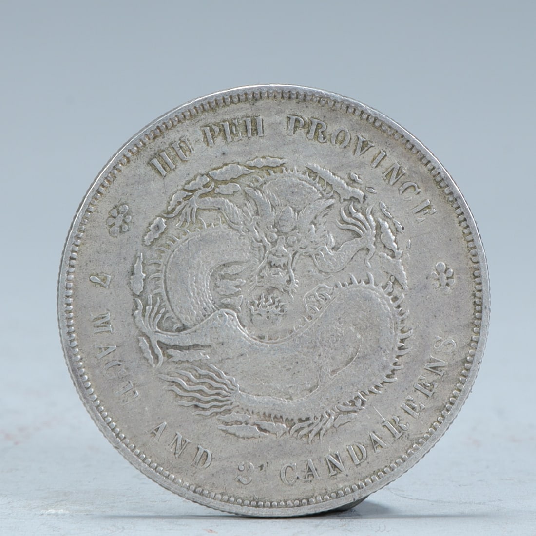 A silver coin made in Hubei Province in the Qing Dynasty made by Guangxu Yuanbao Ping Qian Qian and: In the Qing Dynasty, Hubei Province made Guangxu Yuanbao Treasury Ping seven qian and two cents silver coins SIZE: D:4cm W:26.7g (The Dimensions Of All Batches Are Manually Measured.If You Need More D