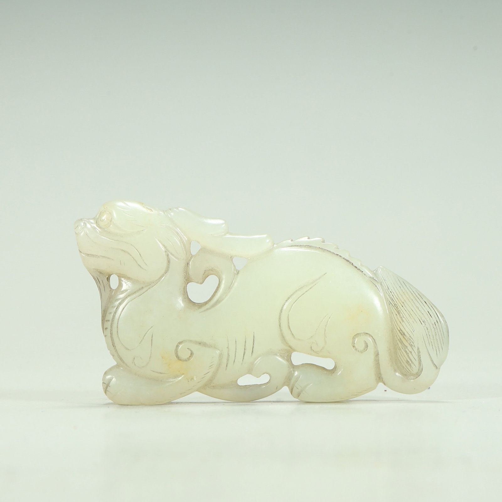 A Qing Dynasty Hetian jade beast: Qing Dynasty Hetian jade beast SIZE: H:4cm L:7cm W:0.8cm W:45.5g (The Dimensions Of All Batches Are Manually Measured.If You Need More Detailed Information, Please Contact Our Customer Service Before 