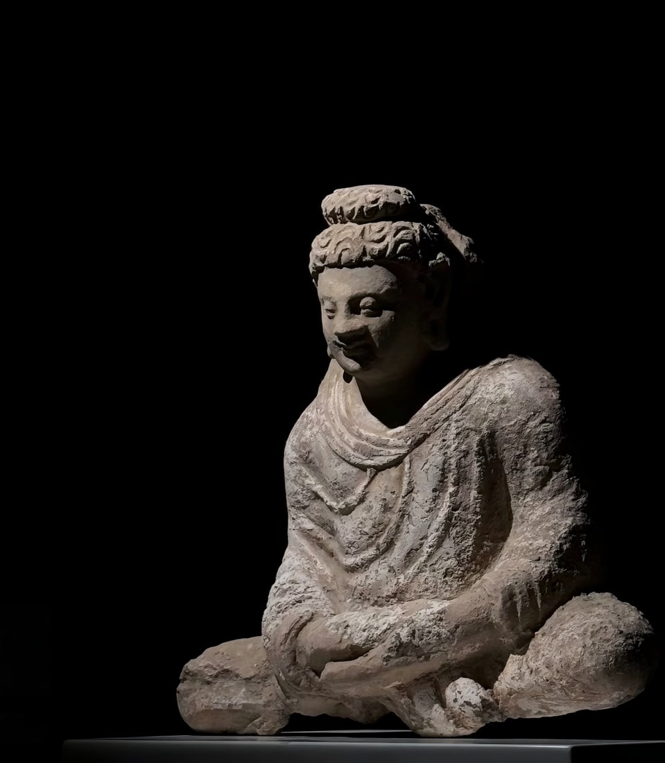 A Gandhara clay Buddha statue made of white plaster from the 2nd to 5th centuries AD (1 of 5)