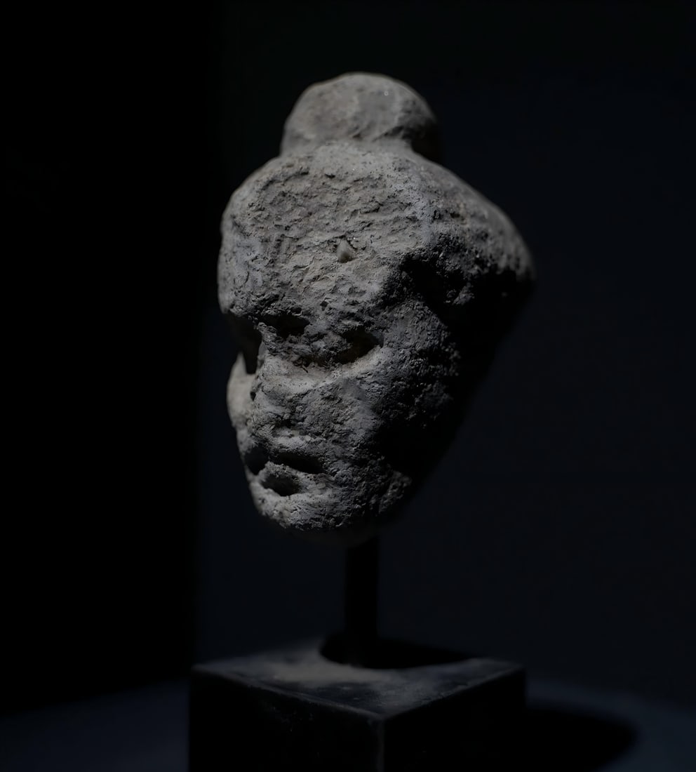 A statue of a Gandhara white plaster ascetic statue of white plaster clay from the 2nd to 5th (1 of 7)