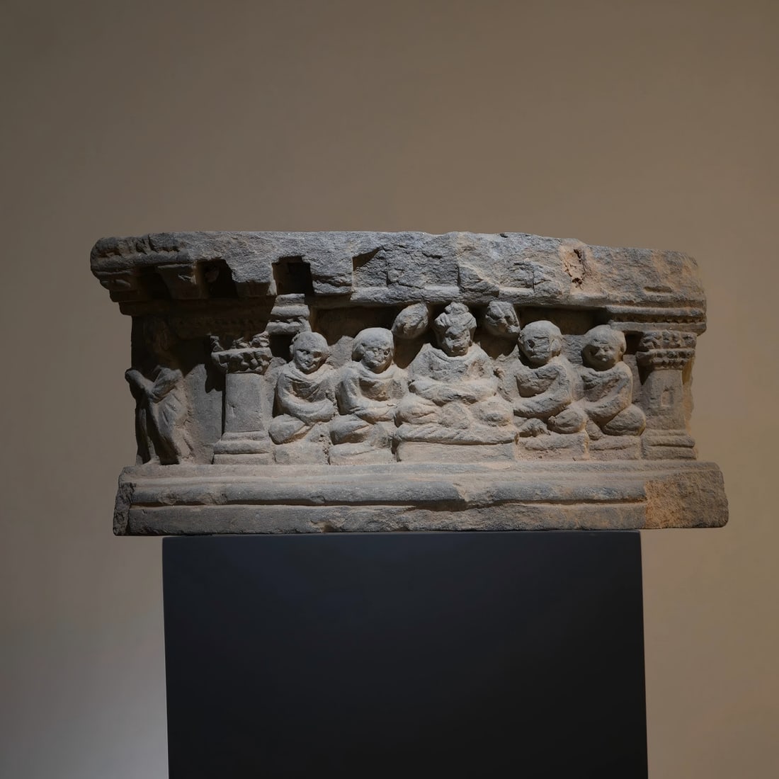 A stone carving of a Gandhara Buddha and his disciples from the 2nd to 5th centuries AD (1 of 5)