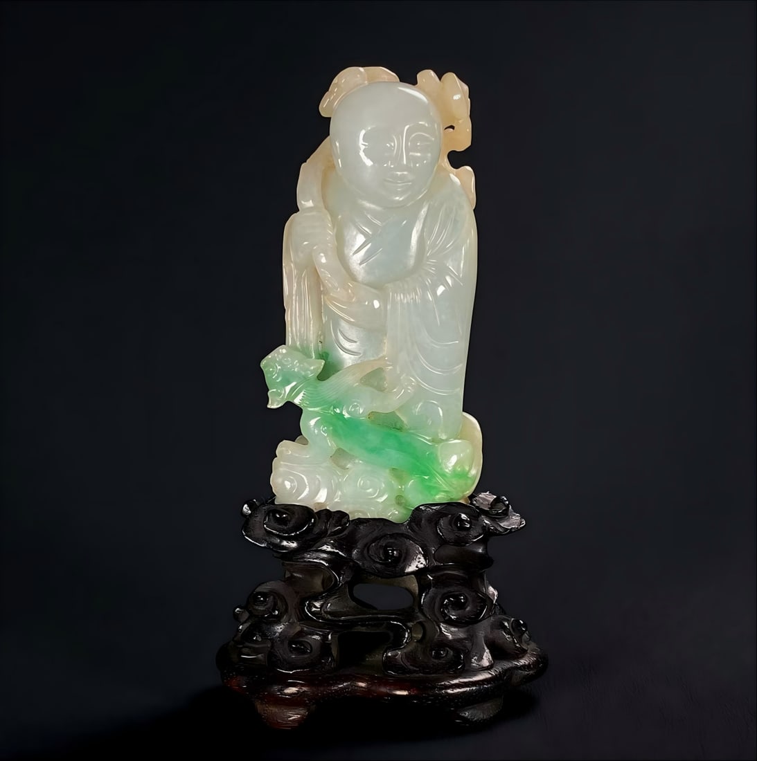 A piece of mid-Qing Dynasty jade Ganoderma lucidum fairy child cloud dragon pattern handle: In the middle of the Qing Dynasty, the green jade Ganoderma lucidum fairy child cloud dragon pattern handle piece is refined from the highest quality jadeite, the emerald color is sparkling, the water